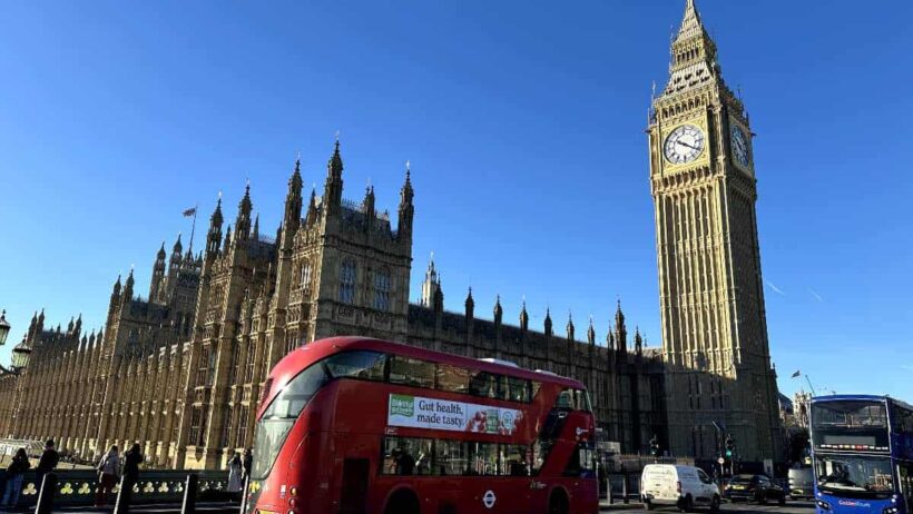 London, England with the Big Ben and a red double decker bus