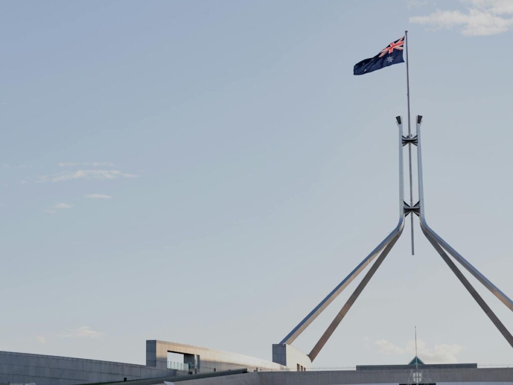 Australian flag atop parliament house