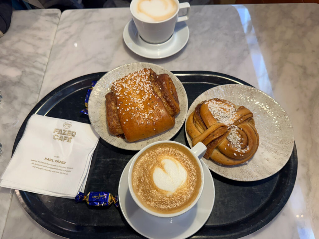 Coffee and cinnamon buns at Fazer Cafe